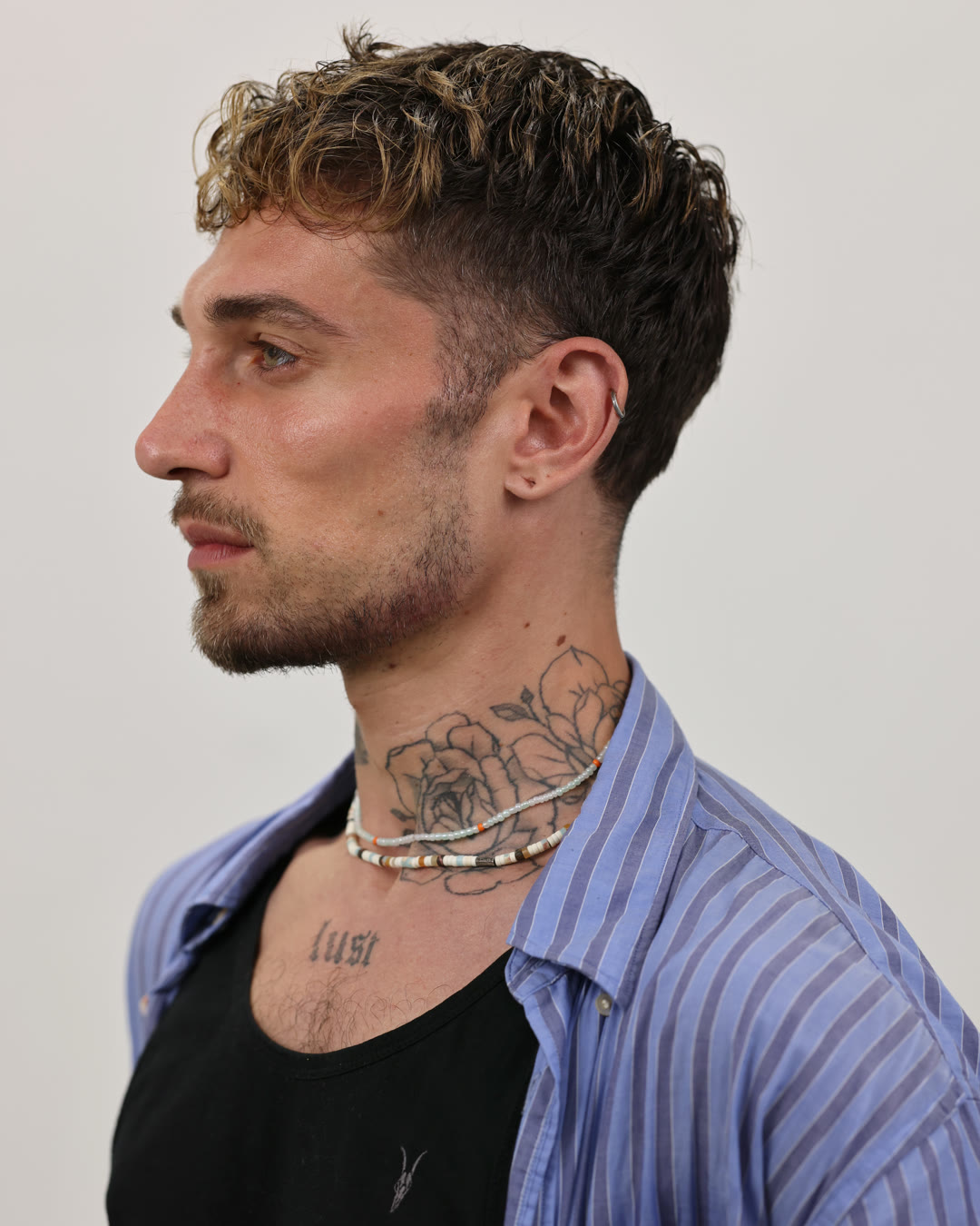 Male profile after chin and jawline treatment, the chin in proportion, unretouched