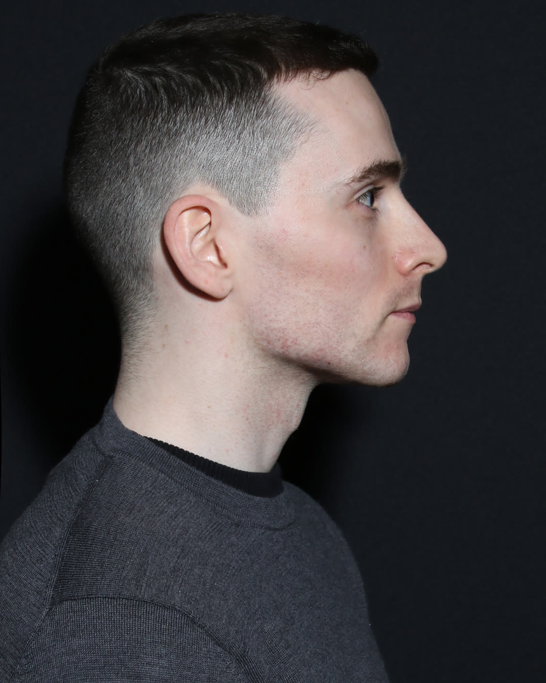 Male profile with a defined jawline, unretouched